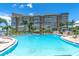 Resort-style community pool with ample space for lounging at 5130 Brittany S Dr # 106, St Petersburg, FL 33715