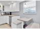 Kitchen breakfast nook with built-in seating at 5130 Brittany S Dr # 106, St Petersburg, FL 33715