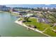 Aerial view of waterfront community with lush green spaces and parking at 5130 Brittany S Dr # 106, St Petersburg, FL 33715