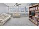 Living room with large windows and ample natural light at 5130 Brittany S Dr # 106, St Petersburg, FL 33715