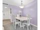 Bright dining room with white table and chairs at 5130 Brittany S Dr # 106, St Petersburg, FL 33715