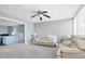 Sitting area with two sofas and a view of bedroom at 5130 Brittany S Dr # 106, St Petersburg, FL 33715