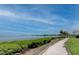 Scenic walkway along the waterfront with tranquil views at 308 Mariner Dr # 308, Tarpon Springs, FL 34689