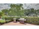 Outdoor grilling area with two grills and seating at 308 Mariner Dr # 308, Tarpon Springs, FL 34689