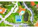 Community pool, tennis and pickleball courts, and pond at 308 Mariner Dr # 308, Tarpon Springs, FL 34689