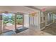 Building entrance with mailboxes and access to the outdoors at 308 Mariner Dr # 308, Tarpon Springs, FL 34689