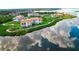Aerial view of waterfront community with lush landscaping at 308 Mariner Dr # 308, Tarpon Springs, FL 34689