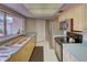 Bright kitchen features stainless steel appliances and ample counter space at 308 Mariner Dr # 308, Tarpon Springs, FL 34689