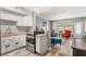Updated kitchen with granite countertops and white cabinets at 4071 55Th N Way # 1051, Kenneth City, FL 33709