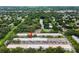 Aerial view showing the condo community and its surroundings at 4071 55Th N Way # 1051, Kenneth City, FL 33709