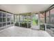 Screened porch with tiled floor and access to backyard at 3455 41St S Ter # 208, St Petersburg, FL 33711