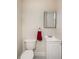 Small bathroom with toilet, sink, and vanity at 3455 41St S Ter # 208, St Petersburg, FL 33711