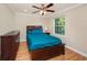 Bedroom with full-size bed and wood floors at 3455 41St S Ter # 208, St Petersburg, FL 33711