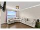 Living room with curved sofa and stunning water views at 100 Pierce St # 1007, Clearwater, FL 33756