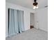 Bright bedroom with neutral carpeting and ample closet space at 10837 109Th N St, Seminole, FL 33778