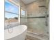 Spa-like bathroom with soaking tub and large walk-in shower at 6016 82Nd N Ter, Pinellas Park, FL 33781
