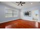 Relaxing bedroom with hardwood floors and en-suite bathroom at 6016 82Nd N Ter, Pinellas Park, FL 33781