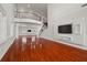 Bright living room features hardwood floors and a large window at 6016 82Nd N Ter, Pinellas Park, FL 33781