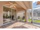 Screened patio with brick pavers and sliding glass doors at 3864 Darston St, Palm Harbor, FL 34685