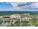 Aerial view showcasing the property's surroundings and nearby amenities at 1950 Lillian Ave, Tarpon Springs, FL 34689