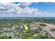Aerial view highlighting the home's location near water and other homes at 1950 Lillian Ave, Tarpon Springs, FL 34689
