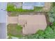 Top-down view of the house showing roof and landscaping at 1950 Lillian Ave, Tarpon Springs, FL 34689