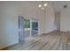 Dining room with sliding glass doors leading to a patio at 1950 Lillian Ave, Tarpon Springs, FL 34689