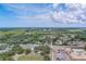 Aerial view showing home's location near water and construction at 1950 Lillian Ave, Tarpon Springs, FL 34689