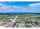 Wide aerial view of a neighborhood near the water at 1950 Lillian Ave, Tarpon Springs, FL 34689