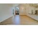Open living room with high ceilings and hardwood floors at 1950 Lillian Ave, Tarpon Springs, FL 34689