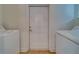 Laundry room with washer and dryer and extra storage at 1950 Lillian Ave, Tarpon Springs, FL 34689
