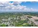 Wide aerial view of the neighborhood including water and construction at 1950 Lillian Ave, Tarpon Springs, FL 34689