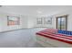 Spacious bedroom with window and American flag bedding at 120 8Th E St, St Petersburg, FL 33715