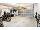 Two-car garage with storage space for bikes and motorcycle at 6460 Fairway View S Blvd, St Petersburg, FL 33707