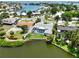 Bird's-eye view of canal-front home with pool and patio at 6460 Fairway View S Blvd, St Petersburg, FL 33707