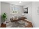 Bright office with modern desk setup, artwork, and hardwood floors at 1200 N Shore Ne Dr # 301, St Petersburg, FL 33701