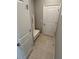 Laundry room with washer, dryer, and additional storage at 14005 Wineberry Dr, Dade City, FL 33525