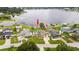Bird's-eye view of a waterfront house with a backyard and a dock at 22607 Southshore Dr, Land O Lakes, FL 34639