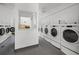 Shared laundry facility with multiple washers and dryers at 1200 N Shore Ne Dr # 301, St Petersburg, FL 33701