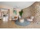 Building lobby with comfortable seating and a stone accent wall at 1200 N Shore Ne Dr # 301, St Petersburg, FL 33701