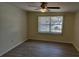 Bright bedroom with vinyl flooring and window coverings at 6731 Sandra Dr, Port Richey, FL 34668