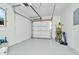 Garage with automatic door opener and extra space at 10617 N 27Th St, Tampa, FL 33612