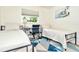 Bedroom with two twin beds and a workspace at 10617 N 27Th St, Tampa, FL 33612