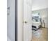 Bathroom with shower and a door to the bedroom at 10617 N 27Th St, Tampa, FL 33612