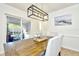 Dining area with sliding glass doors leading to outdoor patio at 10617 N 27Th St, Tampa, FL 33612