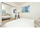 Bedroom with mirrored closet doors and window at 10617 N 27Th St, Tampa, FL 33612