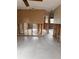 Awaiting transformation, this living room showcases natural light and structural potential for creative remodeling at 704 180Th E Ave, Redington Shores, FL 33708