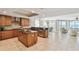 Gourmet kitchen featuring stainless steel appliances, granite countertops, and ample storage at 19820 Gulf Blvd # 401, Indian Shores, FL 33785