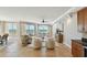 Bright living room featuring beach views, comfortable seating, and neutral tones creating a relaxing atmosphere at 19820 Gulf Blvd # 401, Indian Shores, FL 33785