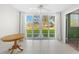 Bright dining area with tile floor and sliding glass doors to a patio at 5095 Bay Ne St # 114, St Petersburg, FL 33703
